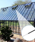 Greenhouse Automatic Vent Opener Kit With Double Spring Roof Control installed on glass greenhouse roof.
