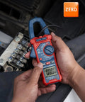 Person using Handy Digital Clamp Meter Multimeter Auto Ranging 4000 Counts For AC DC Voltage And Current, Resistance, Capacitance