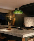Kick Up Any Room Vintage Green Flower Glass Pendant Light With Long Plug In Cord For Kitchen Island And Bedroom, hung over a marble countertop.
