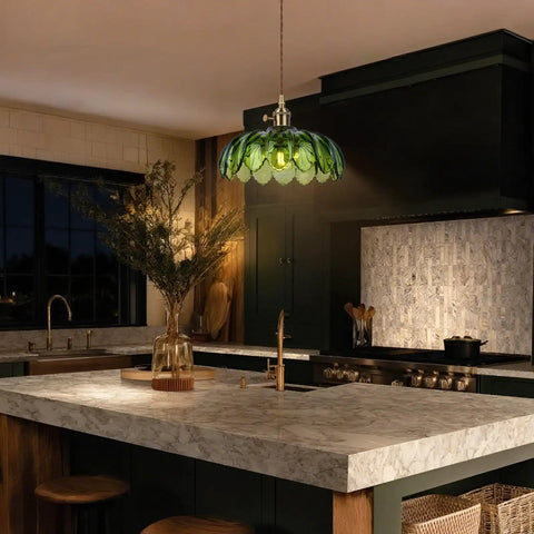 Kick Up Any Room Vintage Green Flower Glass Pendant Light With Long Plug In Cord For Kitchen Island And Bedroom, hung over a marble countertop.