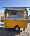 Road Ready Mobile Food Truck Trailer With Dope Commercial Kitchen Setup showing stainless steel sink and yellow exterior.