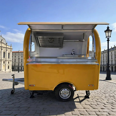 Road Ready Mobile Food Truck Trailer With Dope Commercial Kitchen Setup showing stainless steel sink and yellow exterior.