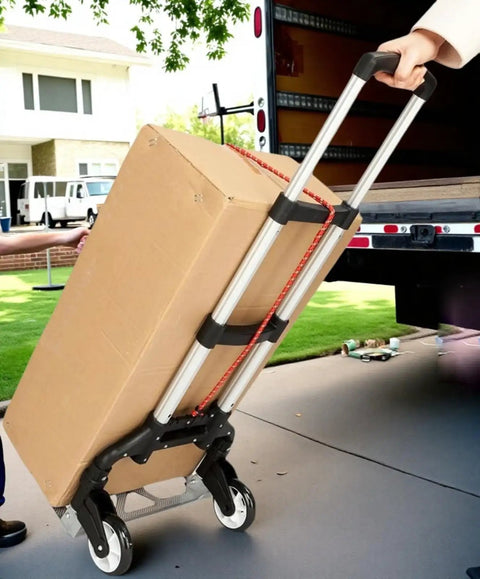 Folding Hand Truck Dolly For Moving And Shopping Aluminum Portable Collapsible Cart 200 lb Capacity with box on it