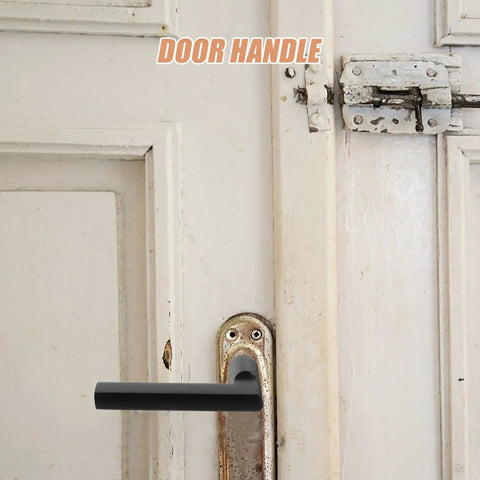 Black Aluminum Door Handle Replacement for Bedroom, Bathroom, and Toilet Doors on a rustic white door.
