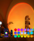 Sunset Projection Lamp With 21 Colors And 180 Degree Rotating Led Light For Party And Bedroom Decor App Control And Push Button Switch Create Romantic Sunset Ambiance Anywhere displaying rainbow colors on wall
