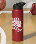 Red stainless steel insulated water bottle with 'Less Noise, More Sky' design on a basketball court
