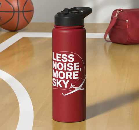 Red stainless steel insulated water bottle with 'Less Noise, More Sky' design on a basketball court