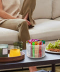360 Degree Rotating Drink Packet Organizer Lazy Susan For Powdered Drink Mixes And Condiments on a coffee table, clear design