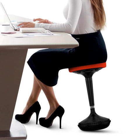Person using Adjustable Standing Desk Stool For Home Office And Classroom Use Ergonomic Active Sitting Chair at desk