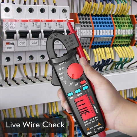 Hand using DC Current Clamp Meter 6000 Counts Digital Multimeter Amp Continuity Ohm Hz Live Check V Alert Voltage Tester