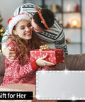 Sun Visor Vanity Mirror With 60 LEDs And 3 Light Modes, shown with a couple exchanging a gift during a festive holiday setting.