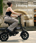 Person riding Folding Electric Bike For Adults And Teens Portable 14 Inch Commuter Ebike With 500W Peak Motor, Matte Black