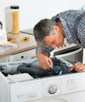 Man repairing a washing machine with 340-Piece Internal Tooth Lock Washers Assortment Kit With Push-On Clips on the counter