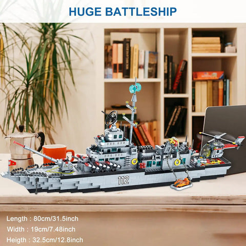 Massive 8 In 1 Military Battleship Building Set With 31.5 Inch Navy Warship Model displayed on a desk in a living room.