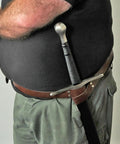 Adjustable Genuine Leather Sword Belt For Costume And LARP with stainless steel buckle, shown on waist holding sword