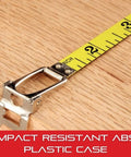 Retractable Long Tape Measure With Durable ABS Case And Folding Hook shown on wooden surface