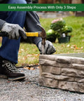 Person assembling raised garden bed kit with ledgestone panels that snap together in 8 by 24 inch natural look stone pattern.