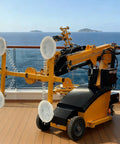 Electric Glass Vacuum Lifter Robot For Smooth Steel And Stone Panel Handling built for curtain wall installations on a deck.
