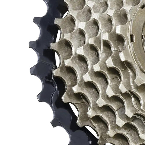 Close-up of 7-Speed Bicycle Freewheel 14-28T Sprocket Set Screw-On Replacement For Mountain And Road Bikes Brass Finish, Stainless Steel Build