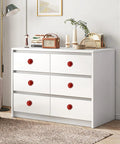 Fire Red Mini Round Cabinet Knobs And Drawer Pulls Set Of 10 With Mounting Screws on white dresser in stylish living room.