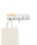 Cubby Entryway Organizer With Mail, Phone, And Wallet Compartment Plus Five Flip Up Hooks For Keys And Small Accessories, White Keeps Everyday Essentials Within Reach And Tidy shown on wall with bag and keys hanging.