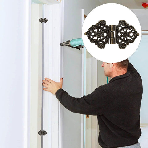 Installation of Antique Zinc Alloy Butterfly Hinges Set on a door frame, part of the 10 Pieces Miniature Furniture Hinges for DIY Projects.