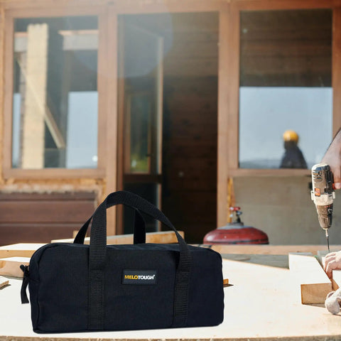 Workhorse Waxed Canvas Tool Tote Bag Set With Two Medium Tool Organizer Bags, 14 Inch Black, on construction site table.