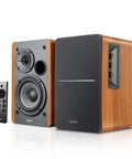 R1280DBs Active Bluetooth Bookshelf Speakers With Optical Input And Sub Out 2.0 Studio Monitor Sound 42W RMS Wood Grain Finish For Desktop Music Home Theater And Computer Setup, showing front and side views with remote control