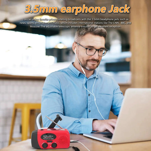 Man using Emergency Weather Radio With AM FM NOAA Reception Hand Crank Power LED Flashlight at a café table with earphones.