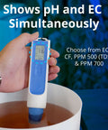 Hand holding 3 In 1 Temperature, EC PPM And pH Meter With Super Fast Readings, Bluetooth Data Sharing And In App Tracking, Replaceable Probe in water