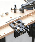 Combination Three-in-One Puncher in use on a wooden board, showing an industrial clamping tool setup with dowel holes and accessories.