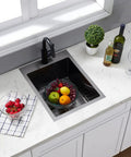 Gunmetal Black Drop In Bar Sink For Small Kitchens And RVs, 15x20 Inch Stainless Steel 16 Gauge Top Mount Wet Bar Prep Sink With 10 Inch Deep Bowl, includes dish grid, installed in white countertop, surrounded by fruits and drinks.