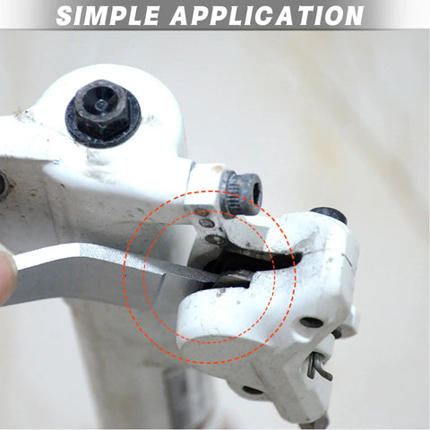 Extended Hydraulic Piston Press For Bicycle Disc Brakes Caliper Pad Spreader Tool on white brake caliper, metal tip in use
