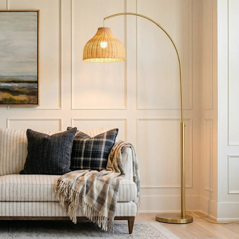 Lark Arc Floor Lamp With Hanging Wicker Shade Brass Tall Standing Light for living room with cozy boho chic decor