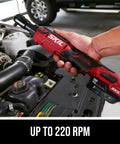 Person using Brushless 12V Ratchet Wrench Kit With 2Ah Battery And PWR Jump Charger on car engine, showcasing three eighths inch drive.