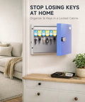 Open 16 Key Wall Mounted Lock Box With Three Digit Combination Lock And Backup Key mounted on wall, showing keys inside.