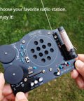 Hands holding AM FM Radio Kit For Learning And Practice A Hands On Soldering Project That Teaches Electronics The Dope STEM Gift New Version
