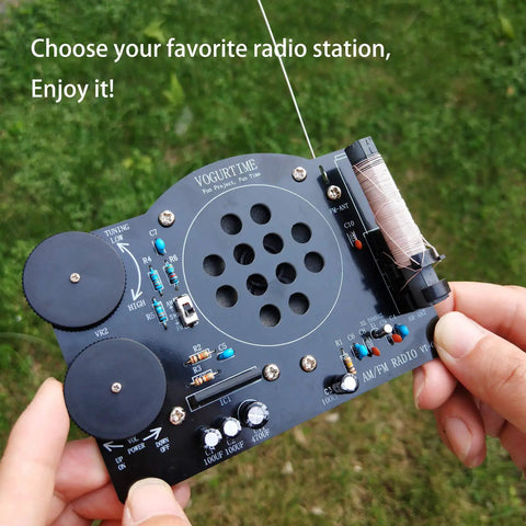 Hands holding AM FM Radio Kit For Learning And Practice A Hands On Soldering Project That Teaches Electronics The Dope STEM Gift New Version