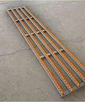 Unpowered Roller Conveyor For Bar Tank Beverage Unloading 30cm By 100cm Splicing Pulley, steel frame with orange rollers
