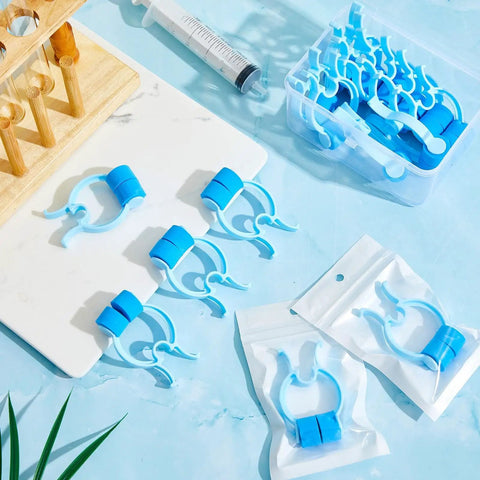 Nosebleed Quick Stop Clip Set With 16 Plastic Foam Clips Handy Storage Box And Pouches Ready For Home Or Grab And Go Emergency Nosebleeds Nasal Bleed Stopper Plugs For Fast Portable Relief displayed on a counter.