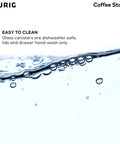 Close-up of bubbles in water with text about cleaning glass canisters in K Cup Pod And Ground Coffee Storage Organizer With Airtight Glass Canisters Holds 12 Oz Ground Coffee And 12 K Cup Pods Black Modern Kitchen Countertop Storage.