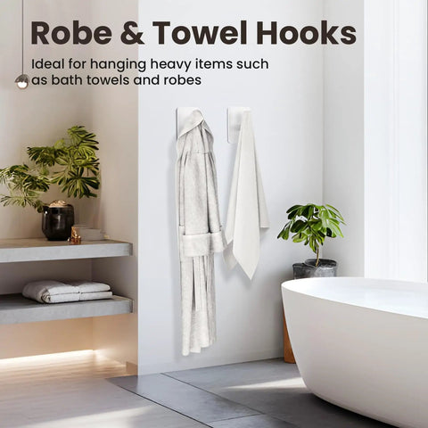 Six Pack Large Stainless Steel Wall Hooks Heavy Duty Adhesive Mount Holds Up To 26 Pounds Bulletproof Grip Stick On Hangers Zero Drill Hassle, white hooks with robe and towel.
