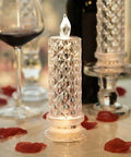 Rose Shadow LED Flameless Candles 4 Pack Battery Operated Pillar Candles For Valentines Proposals Anniversary Weddings Christmas Decor White Romantic Mood Lighting For Home Ambience And Gift Idea on table with rose petals.