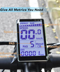 Close-up of Ebike Display M5 with UART No 2 Protocol showing speed, battery level, and ride data on bike handlebars.