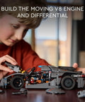 Child assembling Koenigsegg Jesko Absolut Grey Hypercar Buildable Model Kit For Kids And Teens Realistic Sport Car Toy For Racing Fans.