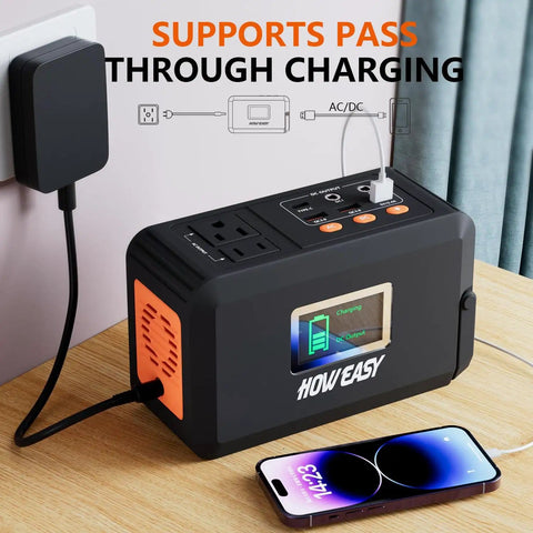 Portable Power Station 120W 240W Peak Solar Generator With 88Wh Battery USB C outlet charging phone on desk