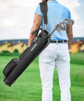 Man carrying an Ultra Lightweight Stand Golf Bag For Men And Women Holds Seven To Eight Clubs Two Way Divider System Built In Cooler