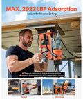 VEVOR magnetic drill press, orange and black, front view being operated by a man on a metal surface