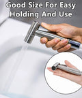 Person holding Two Pack Stainless Steel Handheld Bidet Spray Heads For Bathroom And Toilet Cleaning 8 Lpm Water Flow Durable 304