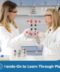 Two women using Organic Chemistry Molecular Model Kit 444 Pcs Complete Set for hands-on learning in a lab environment.
